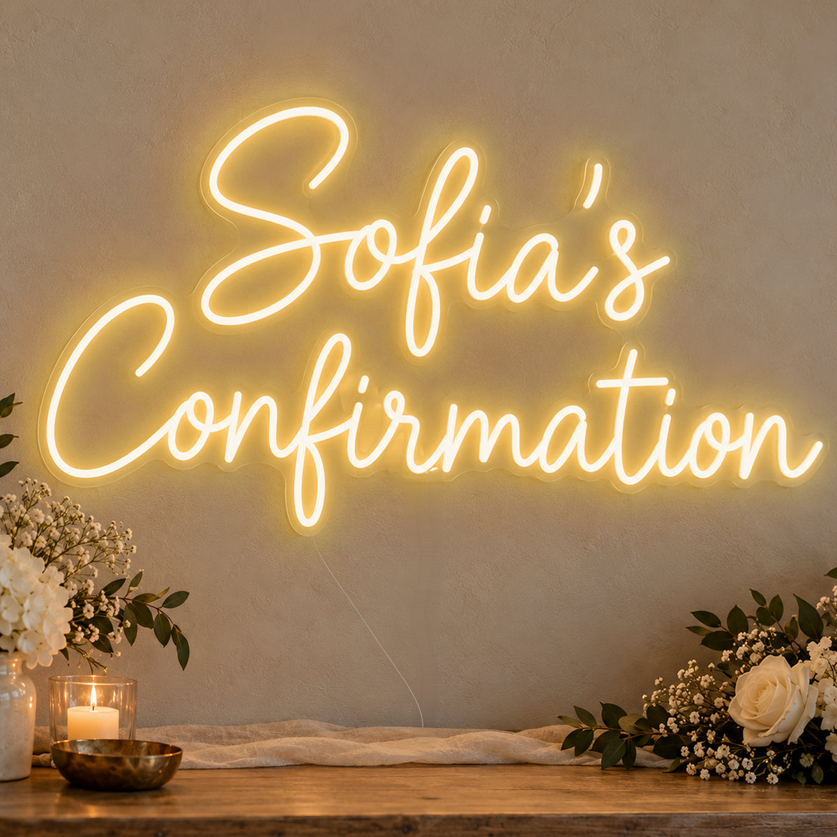 Personalised Confirmation Neon Sign in gold LED neon on clear acrylic, angled view