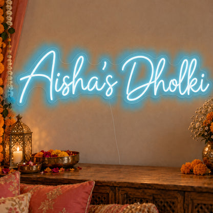 Personalised Dholki Neon Sign in ice blue LED neon on clear acrylic, angled view