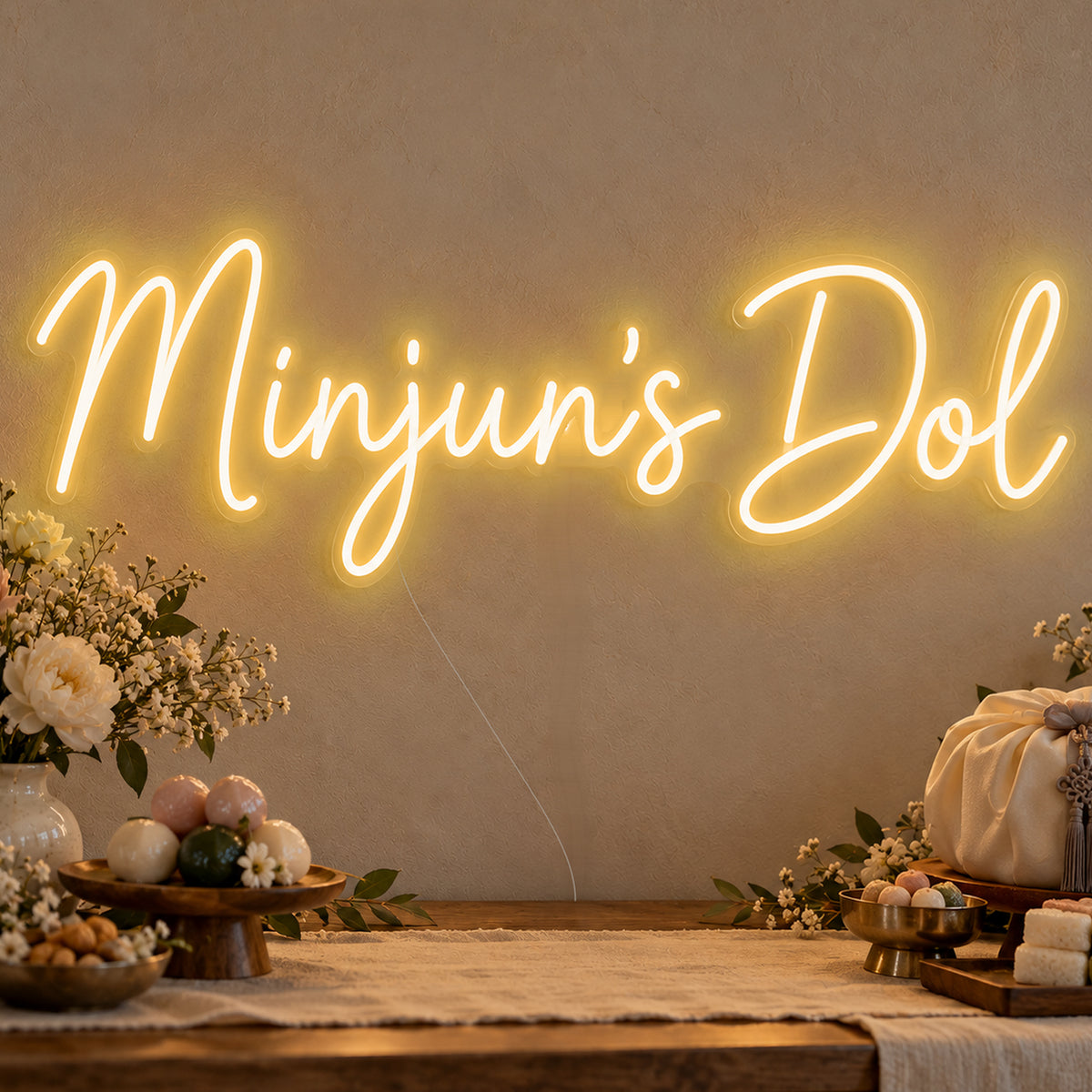Personalised Dol Neon Sign in gold LED neon on clear acrylic, angled view