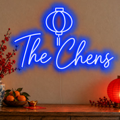 Personalised Family Lantern Neon Sign in blue LED neon on clear acrylic, angled view