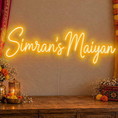 Personalised Maiyan Neon Sign in gold LED neon on clear acrylic, angled view