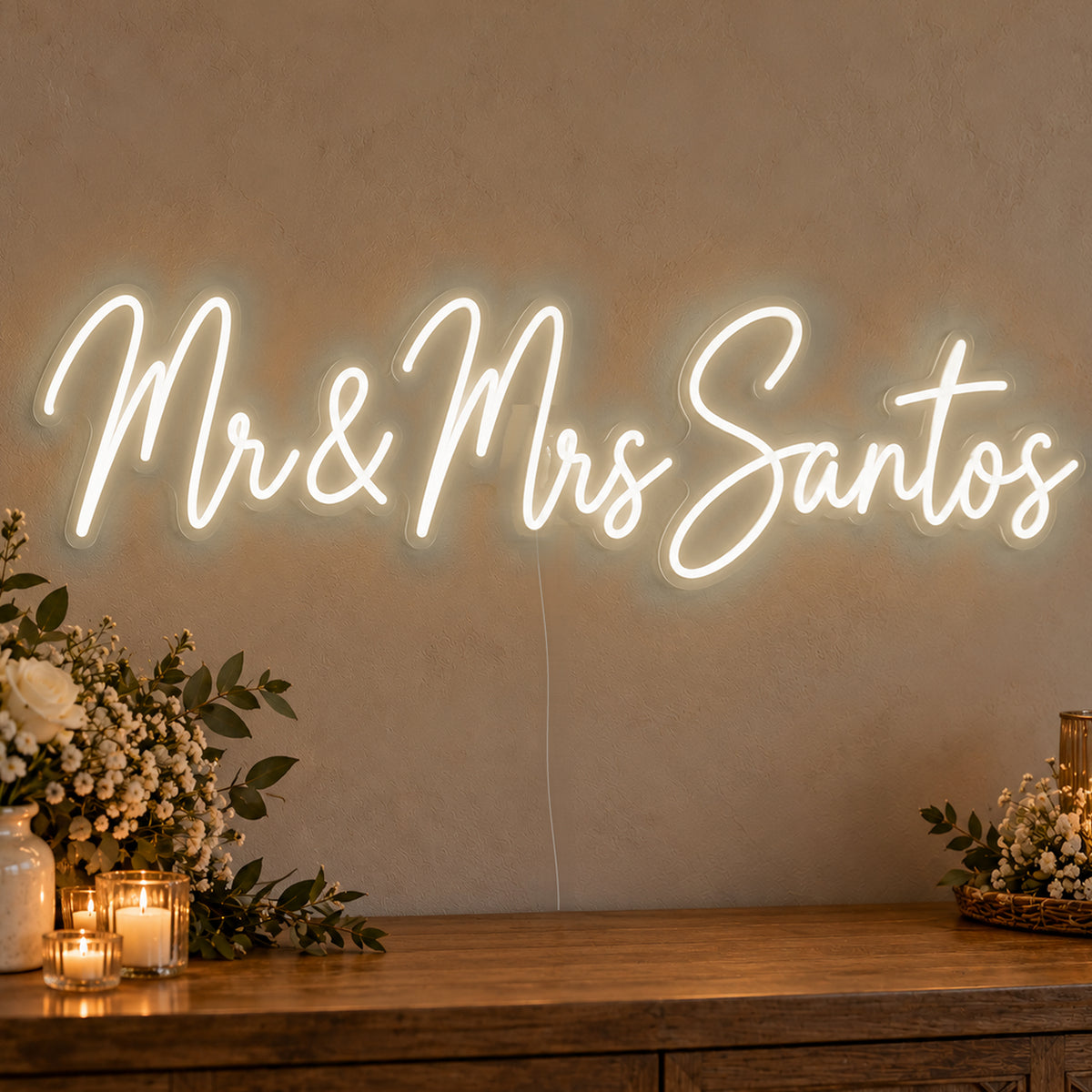 Personalised Mr & Mrs Surname Neon Sign in warm white LED neon on clear acrylic, angled view