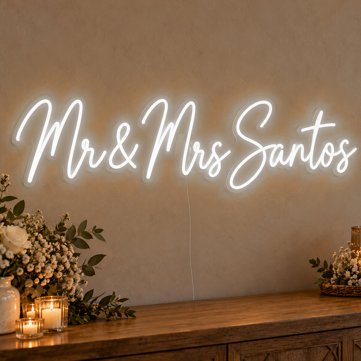 Personalised Mr & Mrs Surname Neon Sign in white LED neon on clear acrylic, angled view