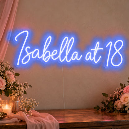 Personalised Name At 18 Neon Sign in blue LED neon on clear acrylic, angled view