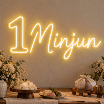 Personalised Name One Neon Sign in gold LED neon on clear acrylic, angled view