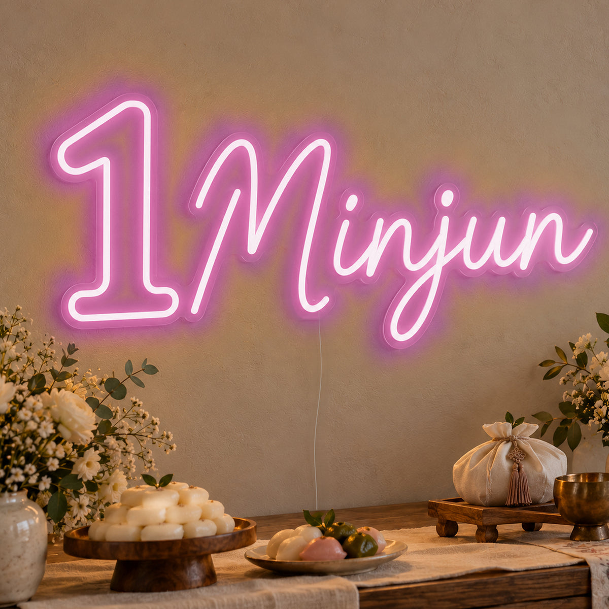 Personalised Name One Neon Sign in pink LED neon on clear acrylic, angled view