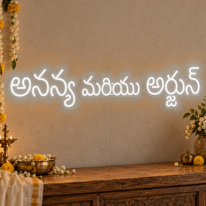 Personalised Telugu Couple Names Neon Sign in white LED neon on clear acrylic, angled view