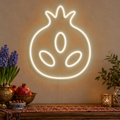 Pomegranate Neon Sign in warm white LED neon on clear acrylic, angled view