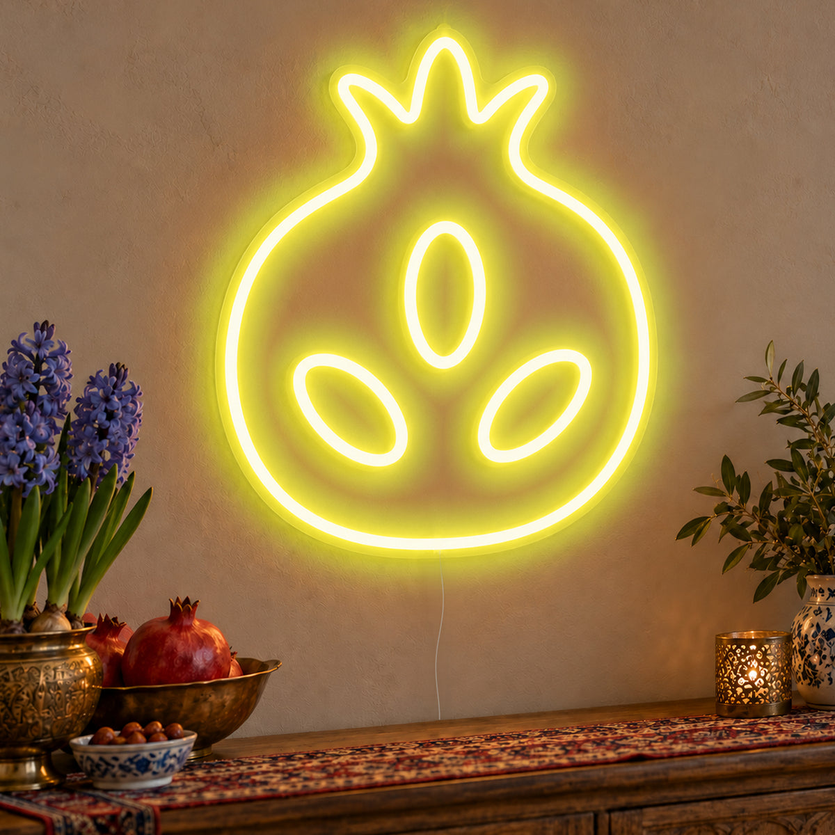 Pomegranate Neon Sign in yellow LED neon on clear acrylic, angled view
