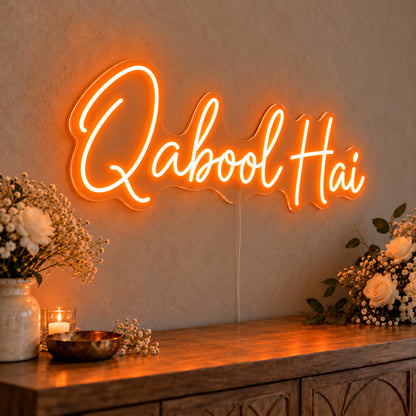 Qabool Hai Neon Sign in orange LED neon on clear acrylic, angled view