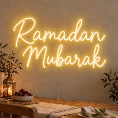 Ramadan Mubarak Neon Sign in gold LED neon on clear acrylic, angled view