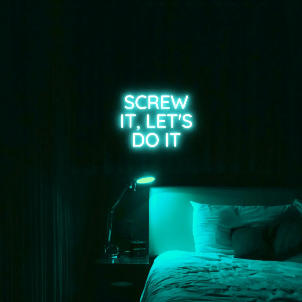 Screw It, Let's Do It LED Neon Light Sign in turquoise, featuring stacked block lettering illuminated above a bed.
